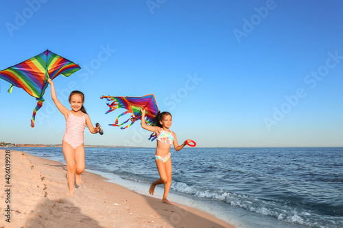 Cute little girls flying ra...