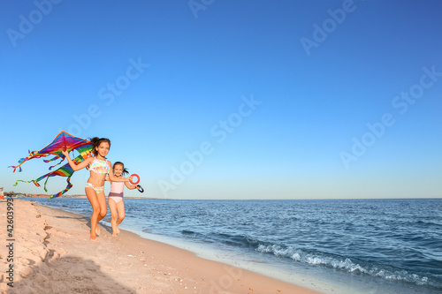 Cute little girls flying ra...