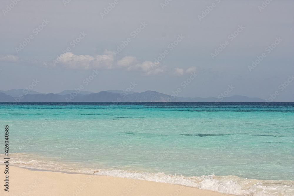 wonderful brilliant sand beach with sea turquoise water, sunny day in paradise