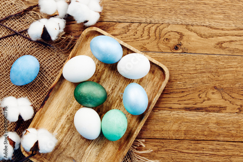 colorful eggs wooden board easter holidays decoration