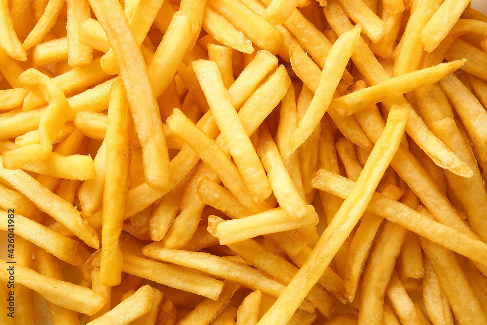 Heap of tasty french fries as background Heap of tasty french fries as background