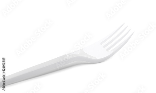 Plastic fork on white background