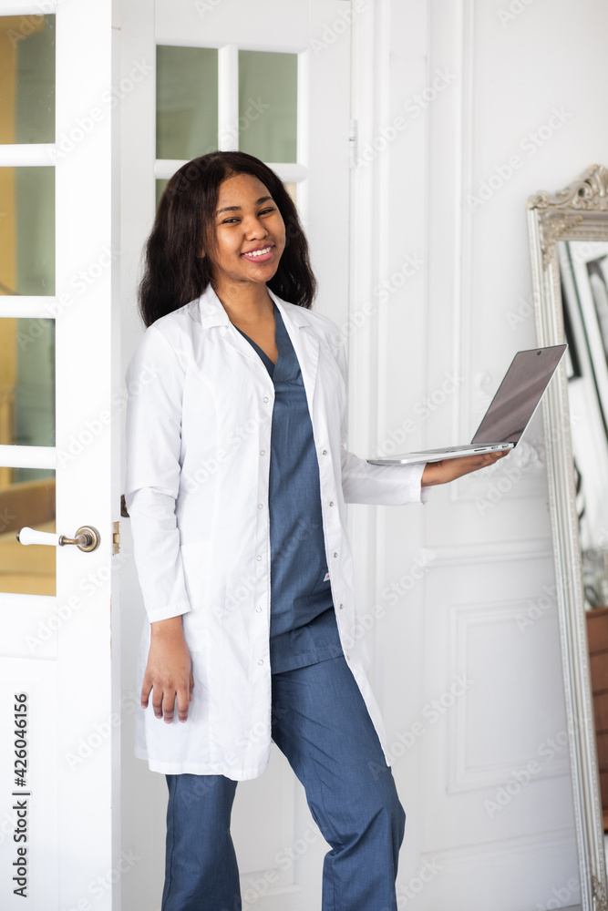 medicine, profession and healthcare concept - close up of african american female doctor or scientist medicine, profession and healthcare concept - close up of african american female doctor or scientist