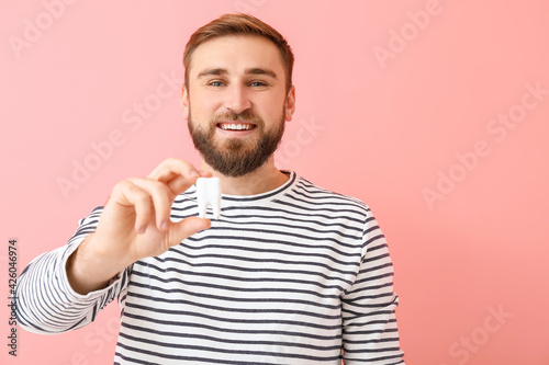 Handsome young man with pla...