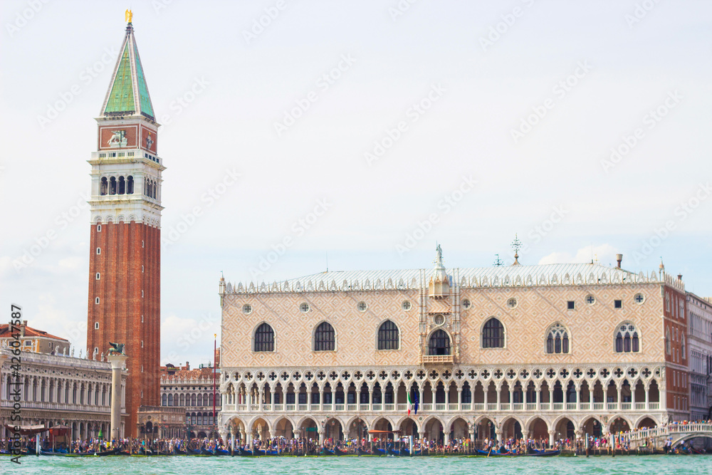 Beautiful Doge's palace and Campanile of Saint Mark's Cathedral on Piazza di San Marco, view from the the Grand Canale in Venice, Italy. Italian buildings cityscape.
