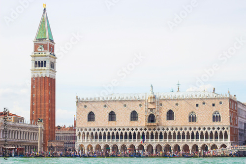Beautiful Doge's palace and Campanile of Saint Mark's Cathedral on Piazza di San Marco, view from the the Grand Canale in Venice, Italy. Italian buildings cityscape. © Blumesser