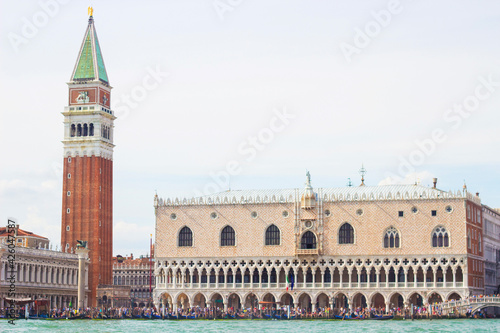 Beautiful Doge's palace and Campanile of Saint Mark's Cathedral on Piazza di San Marco, view from the the Grand Canale in Venice, Italy. Italian buildings cityscape.