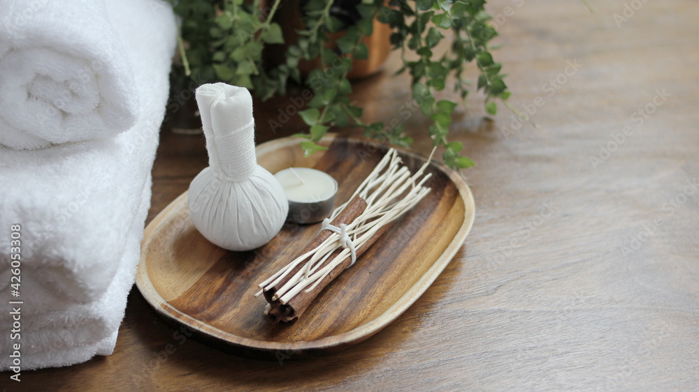 Spa accessories,Beautiful composition of spa , spa relax concept, herbs for massage, beautiful sap set on wood table,For marketing products Spa accessories,Beautiful composition of spa , spa relax concept, herbs for massage, beautiful sap set on wood table,For marketing products