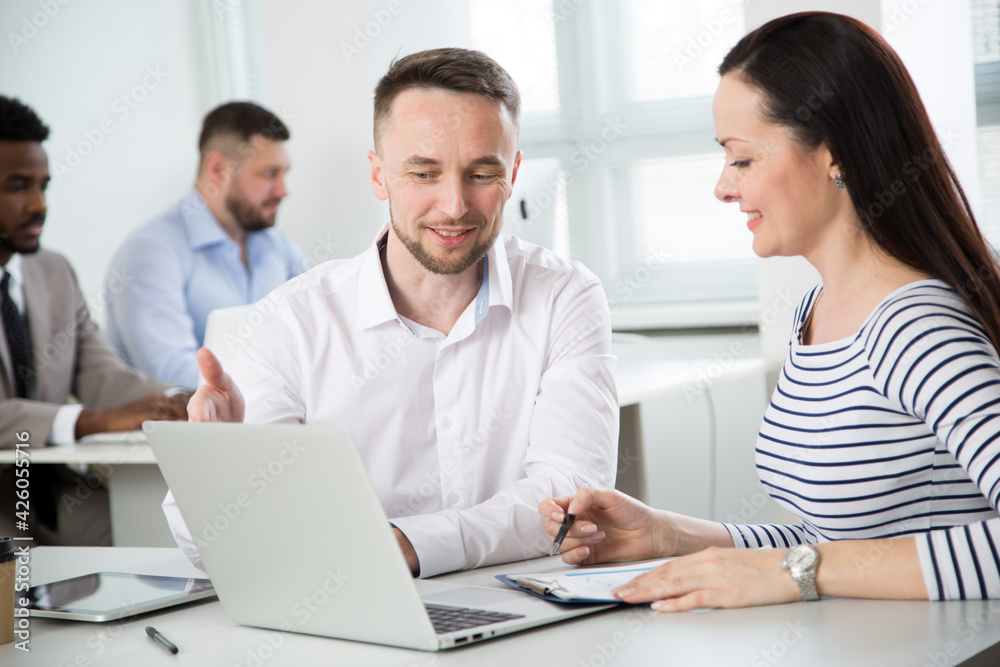 Business people working together in the office Business people working together in the office