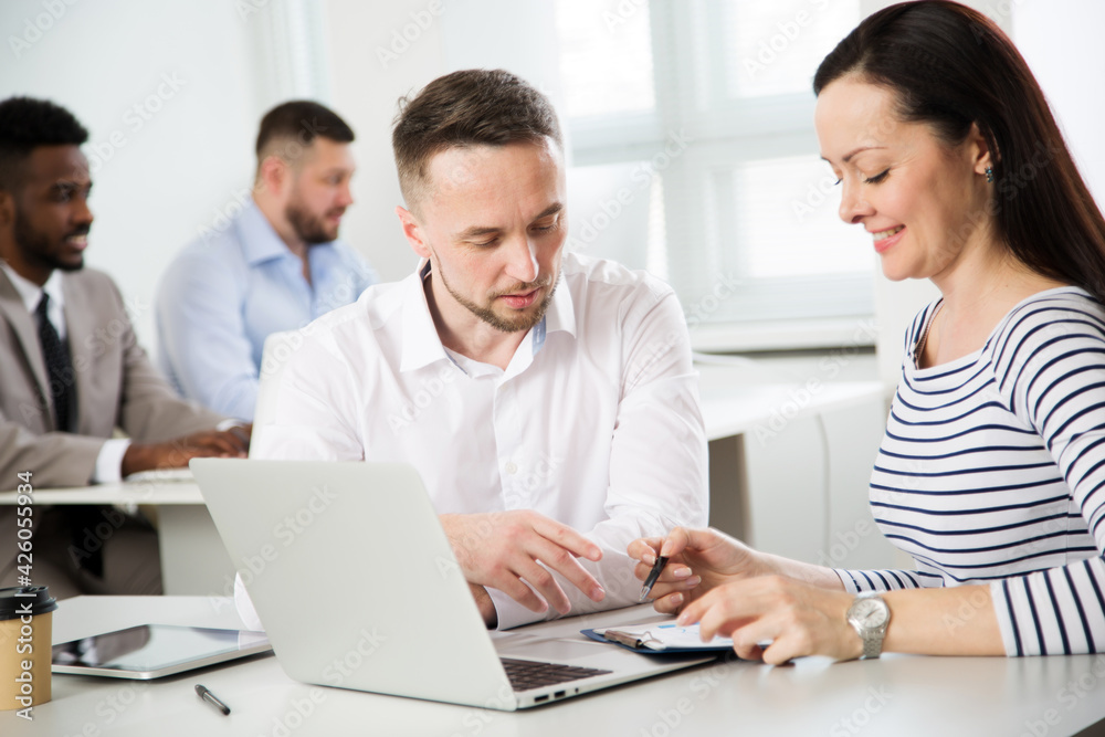 Business people working together in the office Business people working together in the office