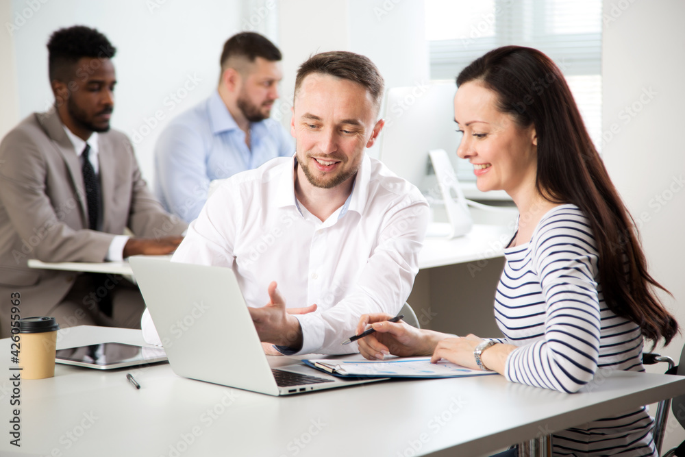 Business people working together in the office Business people working together in the office