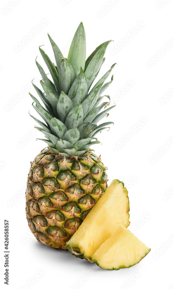 Fresh pineapple with slices on white background Fresh pineapple with slices on white background