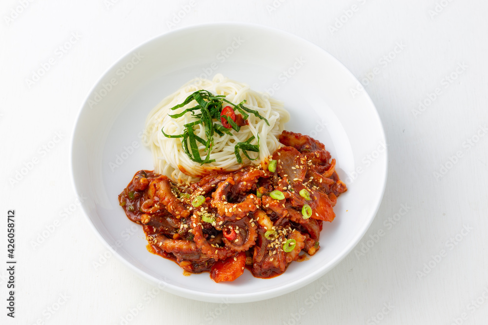 Spicy Squid Stir Fry which is called Ojingeo Bokkeum with thin white noodle Spicy Squid Stir Fry which is called Ojingeo Bokkeum with thin white noodle