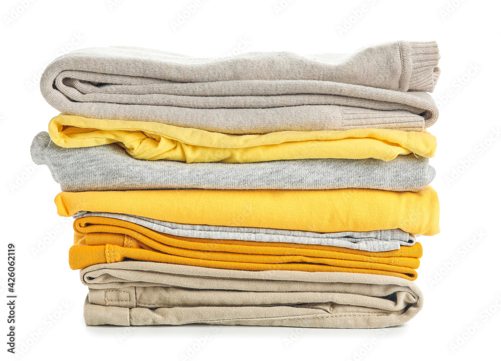 Stack of stylish clothes on white background Stack of stylish clothes on white background