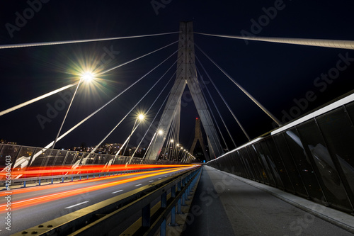 Long exposure shot of the Poya bridge, with vehicle light trails and public lights, shot in Fribourg, Switzerland