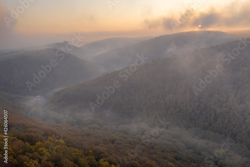 Fingle Bridge and the Teign Valley at dawn on a misty autumn morning, Dartmoor National Park, Devon, England, United Kingdom photo