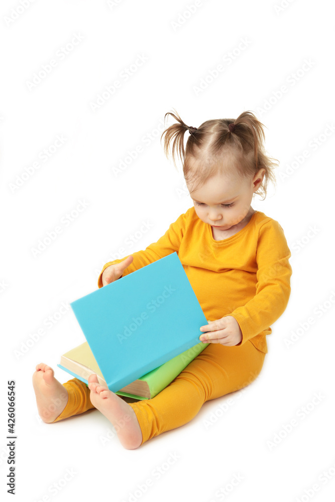 Little girl reading isolated on white. Cute baby with book Little girl reading isolated on white. Cute baby with book