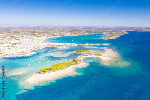 Aerial view of Porto Cesareo coastal town washed by the clear sea, Lecce province, Salento, Apulia, Italy photo