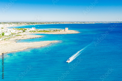 Fishing boat in the blue Ionian Sea, Torre Lapillo, Porto Cesareo, Lecce province, Salento, Apulia, Italy