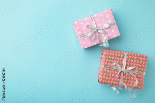 Gift boxes on blue background. Valentine's Day, Happy Women's Day, Mother's Day, Birthday, Wedding, Christmas. space for text