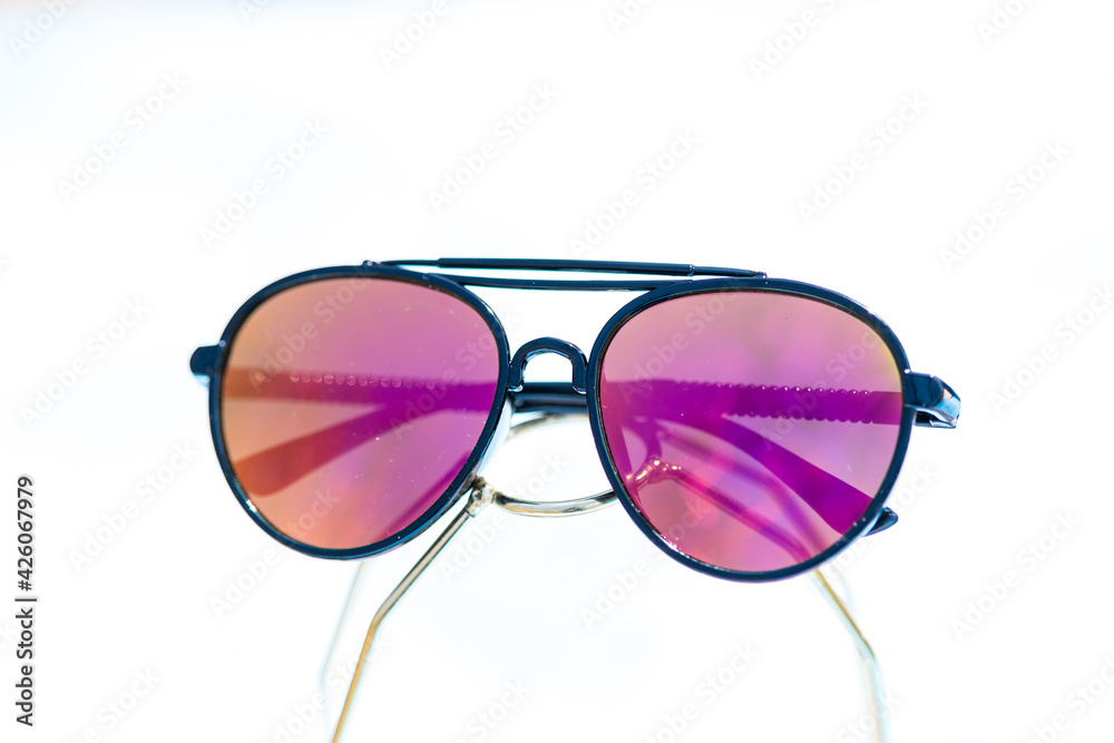 Sunglasses aviator design with big lenses shoot outside in a summer day closeup . Selective focus. High quality photo