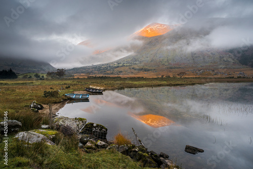 Macgillycuddy's Reeks mountains reflected in Lough Gummeenduff, evening sunlight, Black Valley, Killarney, County Kerry, Munster, Republic of Ireland photo