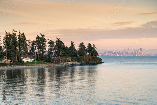 Bainbridge Island at sunset, with Seattle cityscape in the background, Seattle, Kitsap county, Washington State, United States of America