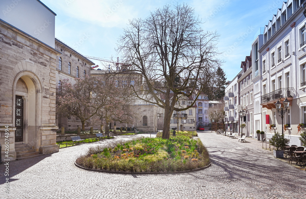 Willy Brandt square and the old Justice building on Sophienstreet in Baden Baden. In the middle is a neoclassical fountain designed by Friedrich Schinkel. Baden Wuerttemberg, Germany, Europe. 