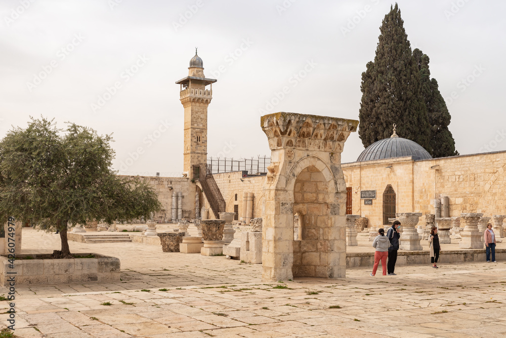 Mihrab Wa Mastabat Al-Sunawabar - pine prayer niche against the backdrop of the Muslim Museum and the corner minaret, on the Temple Mount, in the old city of Jerusalem, in Israel