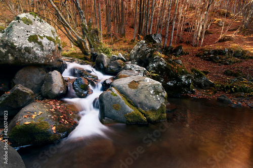 Long exposure at Dardagna waterfalls in autumn, Parco Regionale del Corno alle Scale, Emilia Romagna, Italy photo