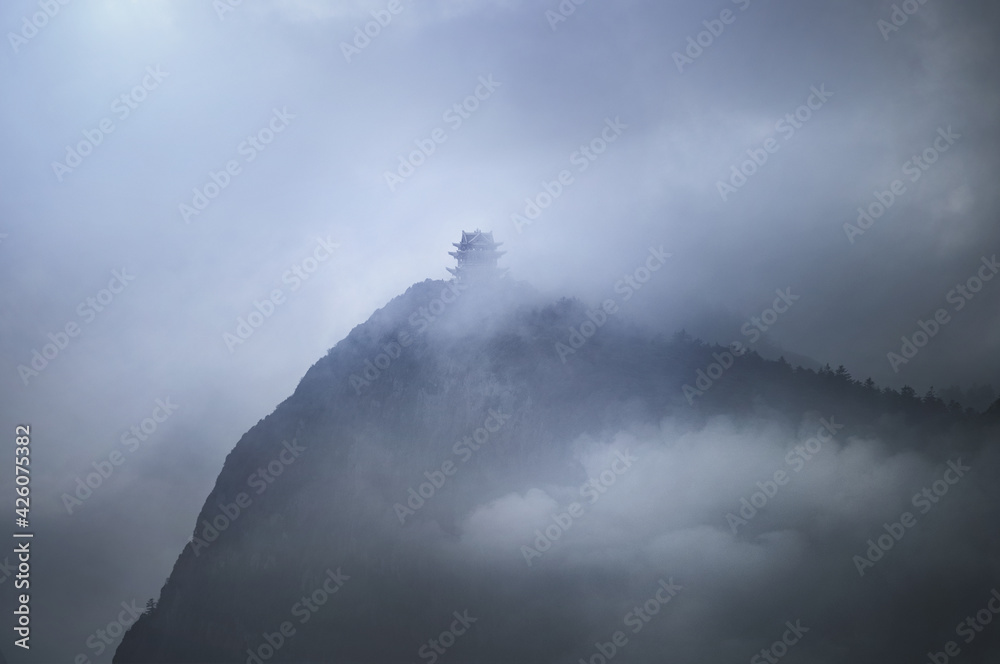 Misty pagoda in the fog on top of Emeishan, Sichuan, China Misty pagoda in the fog on top of Emeishan, Sichuan, China