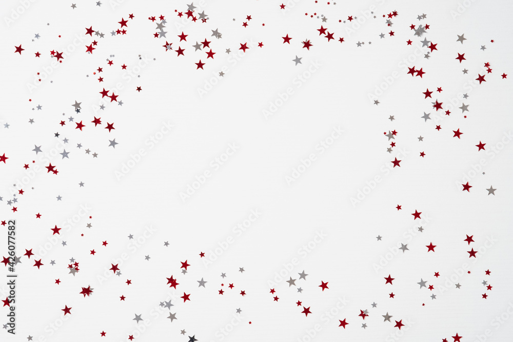 Happy Canada Day greeting card mockup. Frame of star shaped red and white confetti on white background.