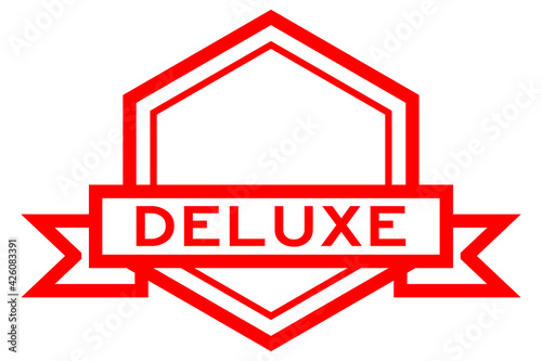 Vintage red color hexagon label banner with word deluxe on white background