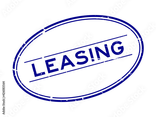 Grunge blue leasing word oval rubber seal stamp on white background