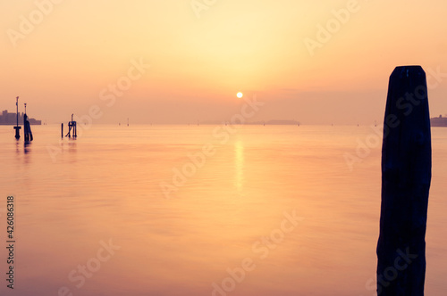 Colourful orange sunset over Venice lagoon