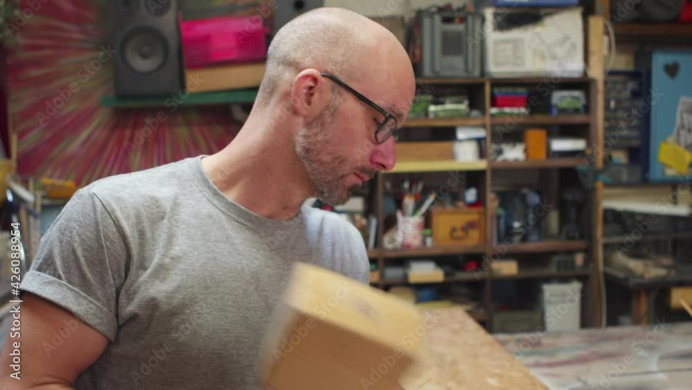 carpenter using wooden hammer medium shot slowmotion carpenter using wooden hammer medium shot slowmotion