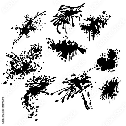 Set of black ink splashes and drops. Different handdrawn spray design elements. Black paint, ink brush strokes, brushes, lines. Vector set