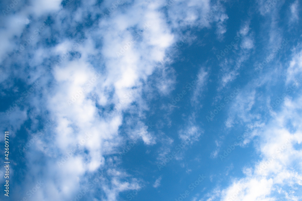 Picturesque clouds in blue sky on sunny day Picturesque clouds in blue sky on sunny day