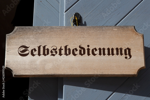 Quadro em tela Signpost self-service at a mountain hut