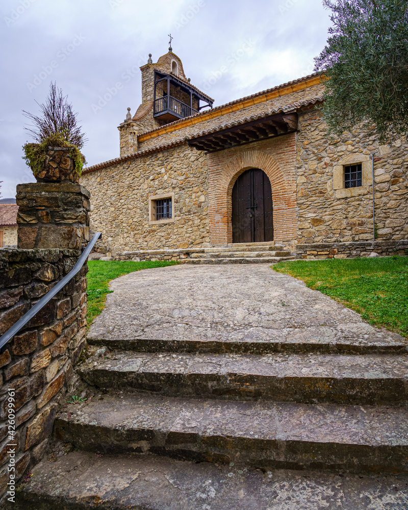 Ancient medieval church made of stone with stair access and tower with balcony. Horcajuelo Madrid. Ancient medieval church made of stone with stair access and tower with balcony. Horcajuelo Madrid.