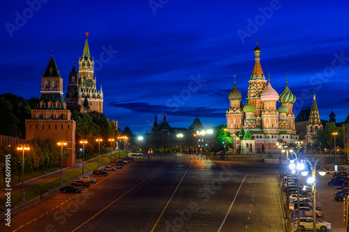 Saint Basil's Cathedral, Spasskaya Tower and Red Square in Moscow, Russia. Architecture and landmarks of Moscow. Night cityscape of Moscow Kremlin