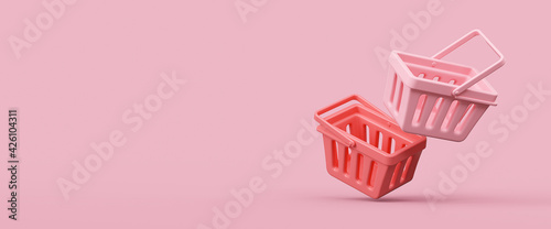 Bild auf Leinwand Empty shopping baskets on pink background
