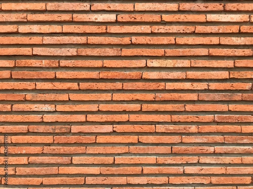 Brown masonry wall with tidy pattern