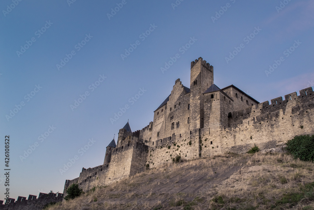 Defense walls of the historic medieval castle of Carcassone, France.