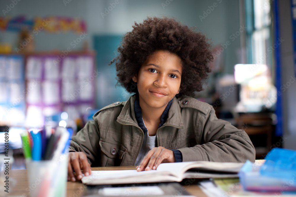 African American boy studying in classroom African American boy studying in classroom