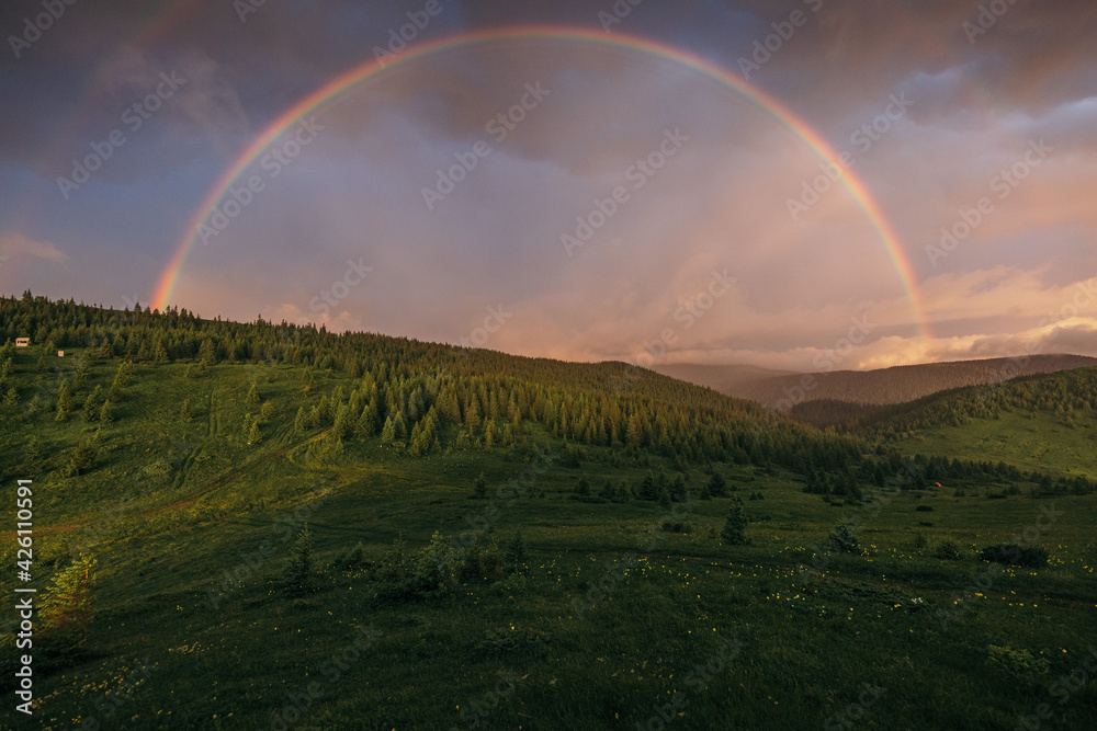 A rainbow over a field A rainbow over a field