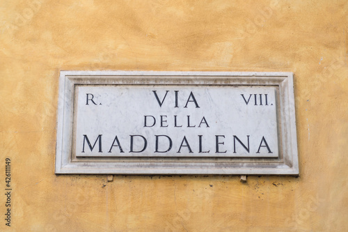 Street sign in Rome, marble plate on street wall with te writing : "Via della Maddalena