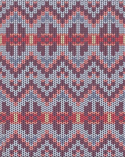 Geometric ornament of rhombuses and triangles in the native American style. Seamless pattern in knitted style for web, print, textile, wallpaper, card, wrapping paper and background