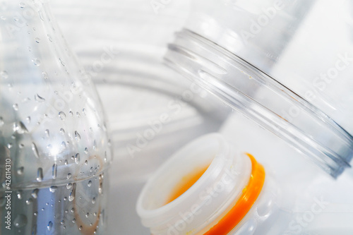 Close-up of plastic bottles photo