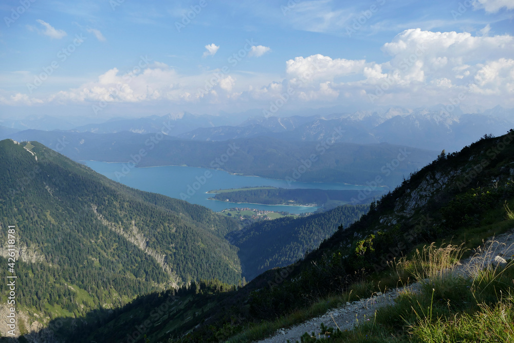Fototapeta premium Scenic landscape panorama Martinskopf mountain and lake Walchensee in Bavaria, Germany